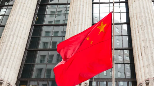 chinese flag in front of government building